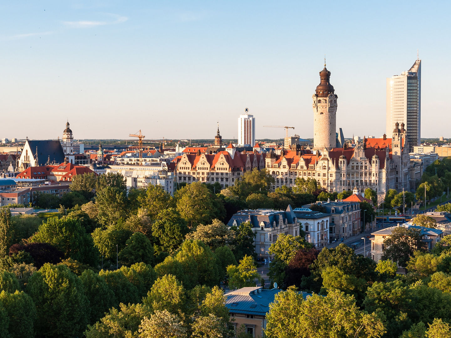 Skyline of Leipzig with townhall at sunset, Germany