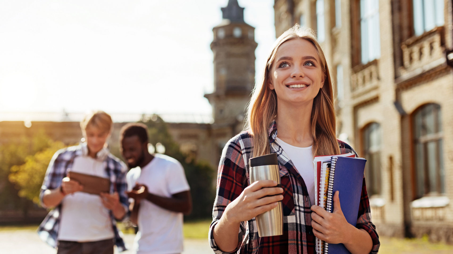 Jolly freshman. Dedicated diligent vibrant girl heading to the class while attending university and being excited