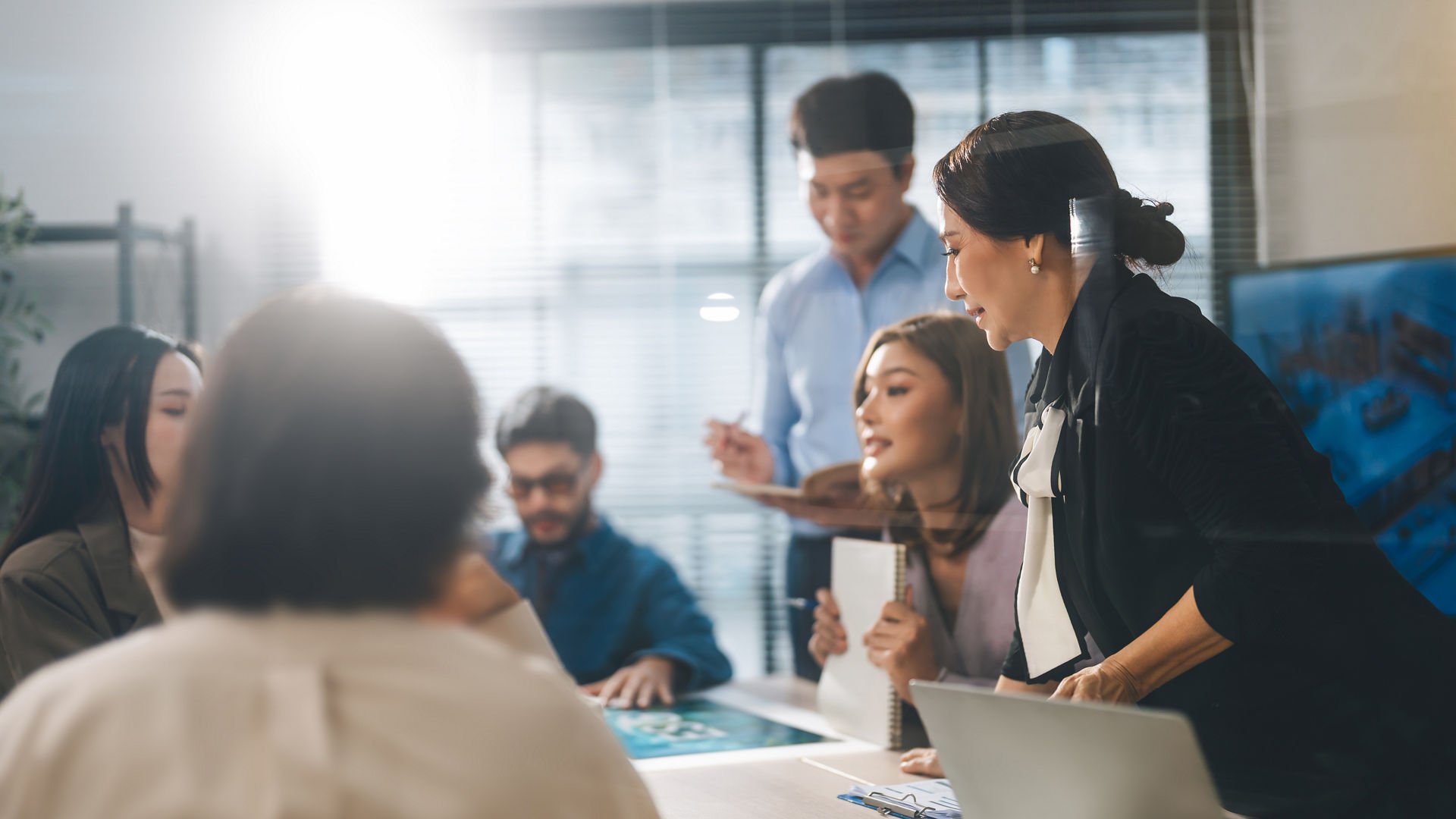 Leader business mature woman asian with leadership team skill concept. Working together meeting and presentation strategy. Corporate asia company brianstorming at modern workspace office.