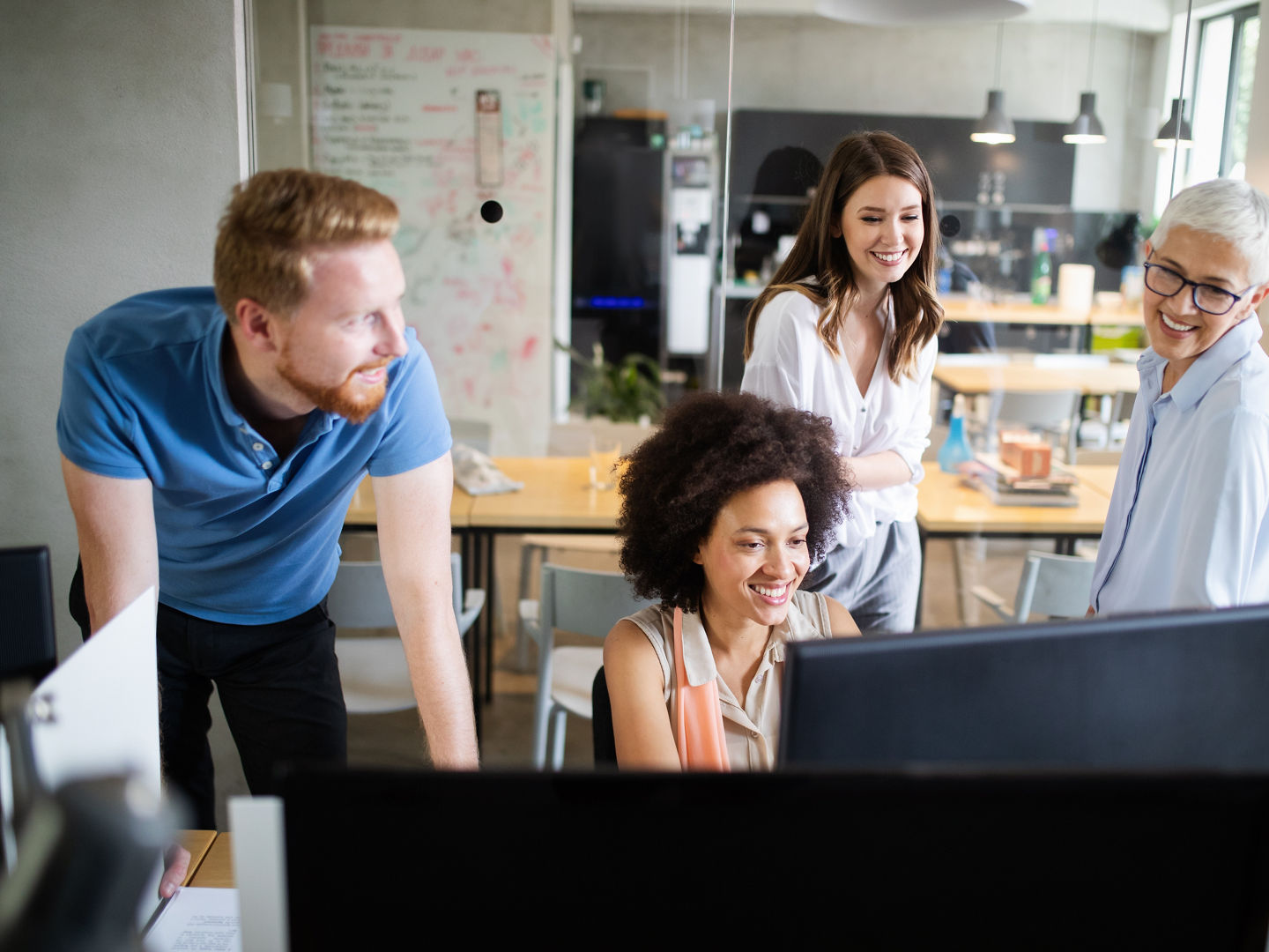 Programmers working in a software developing company office