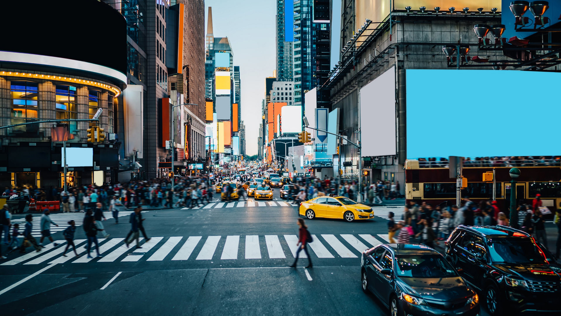 Famous Times Square landmark in New York downtown with mock up billboards for advertising and commercial information content. Big metropolis urban scene with development infrastructure with Lighboxes