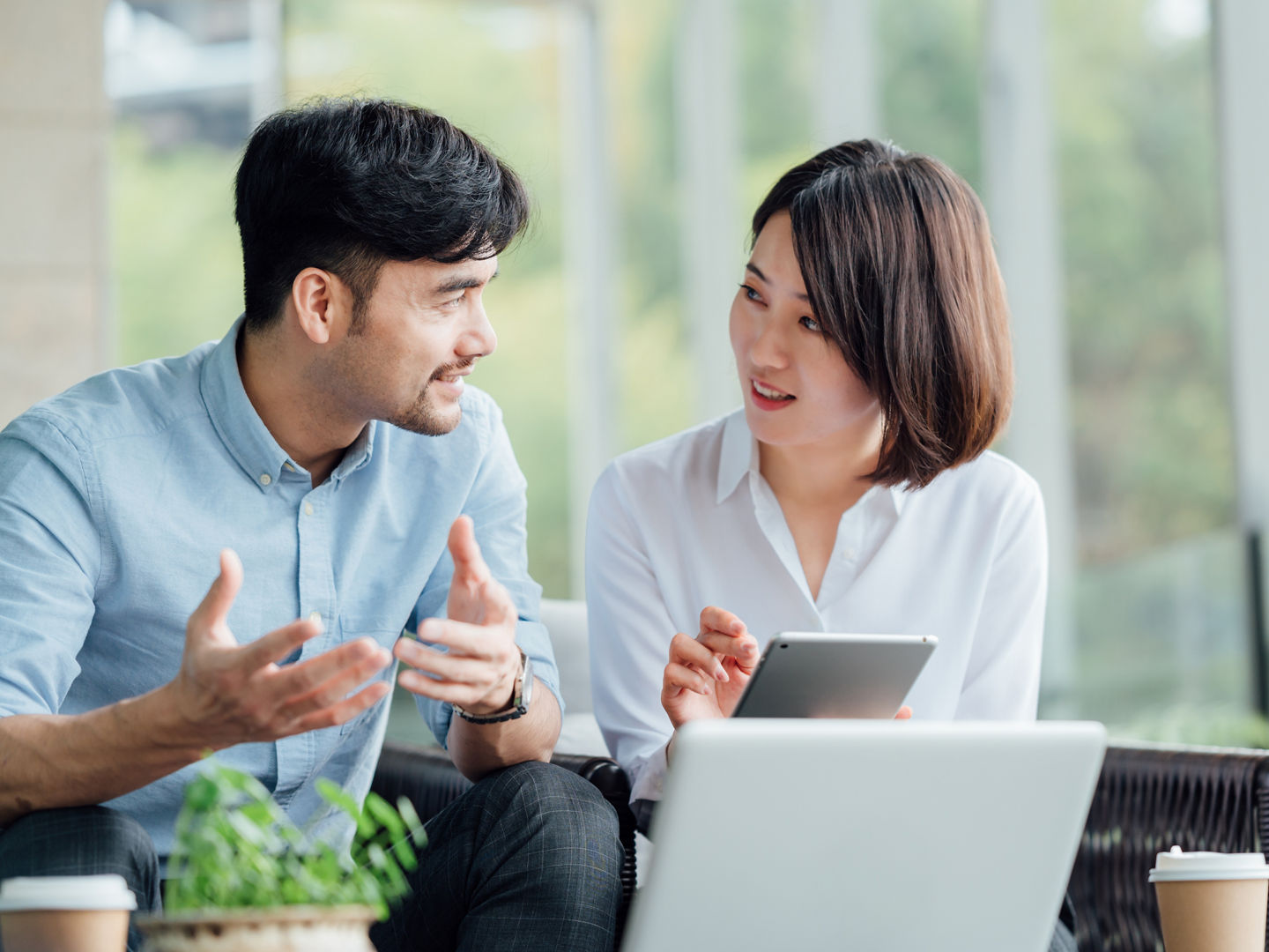 Young Asian business man and woman