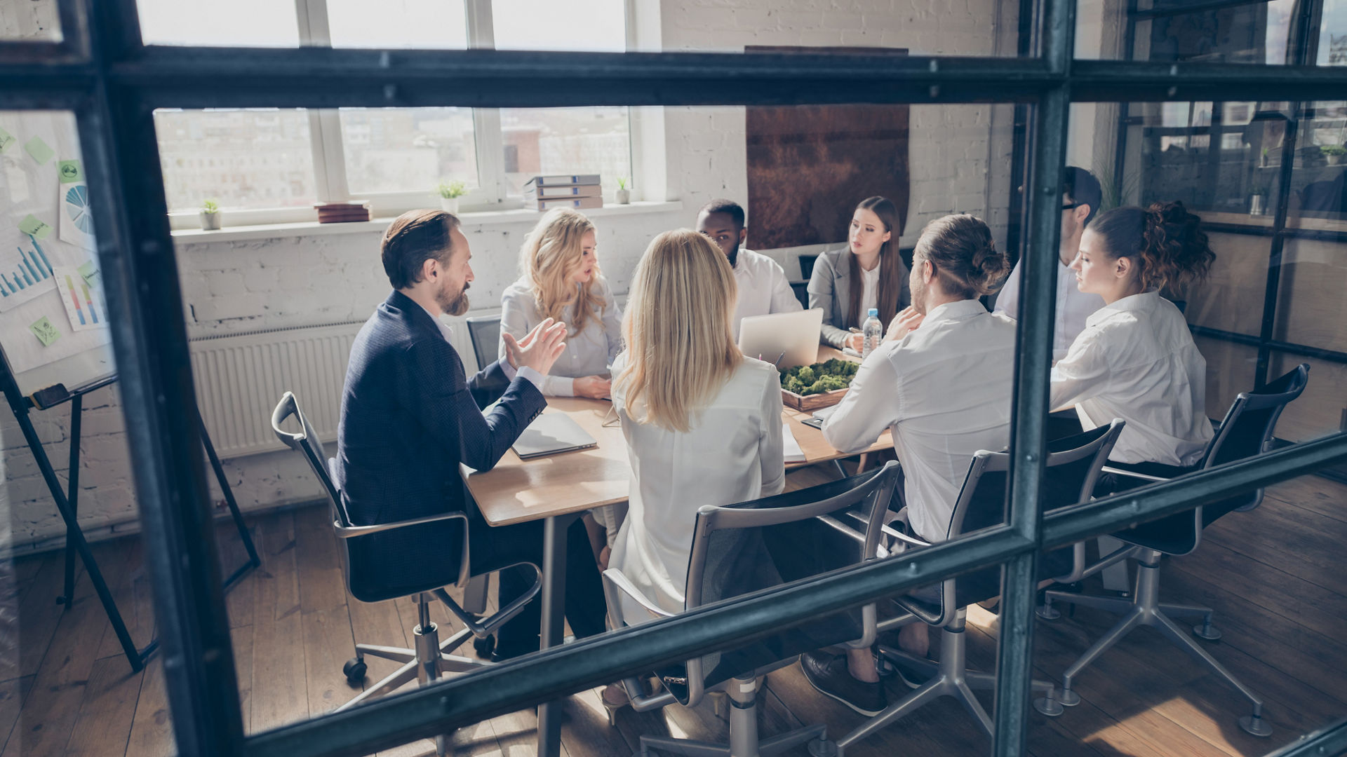 Nice attractive focused stylish experienced executive managers collaborators gathering, listening ceo boss chief marketing industry department at loft industrial style interior workplace workstation