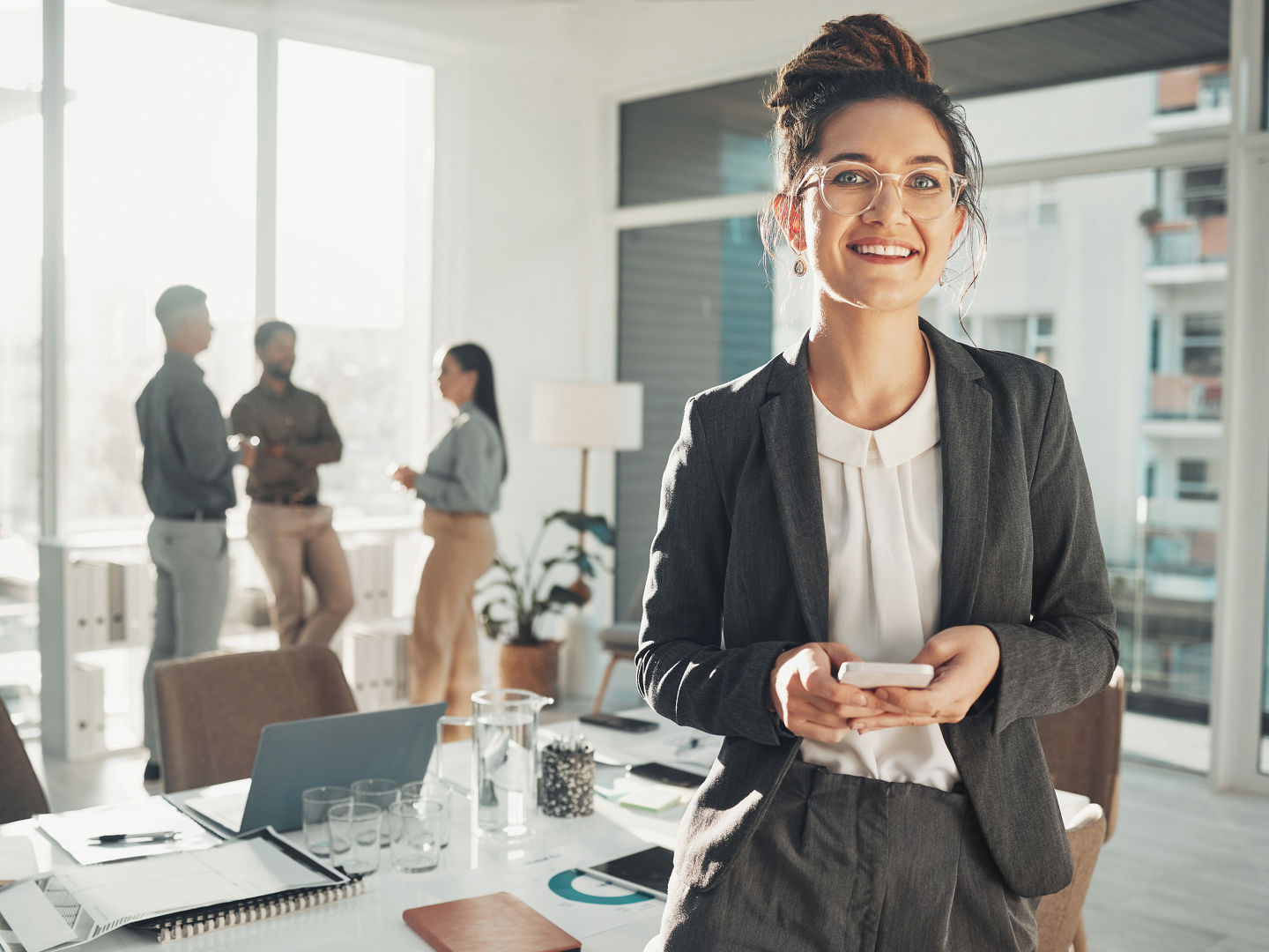 Business woman, portrait and phone in boardroom, meeting room and Sweden company. Happy office worker typing on smartphone app, notification or contact management of corporate career, mobile or smile.