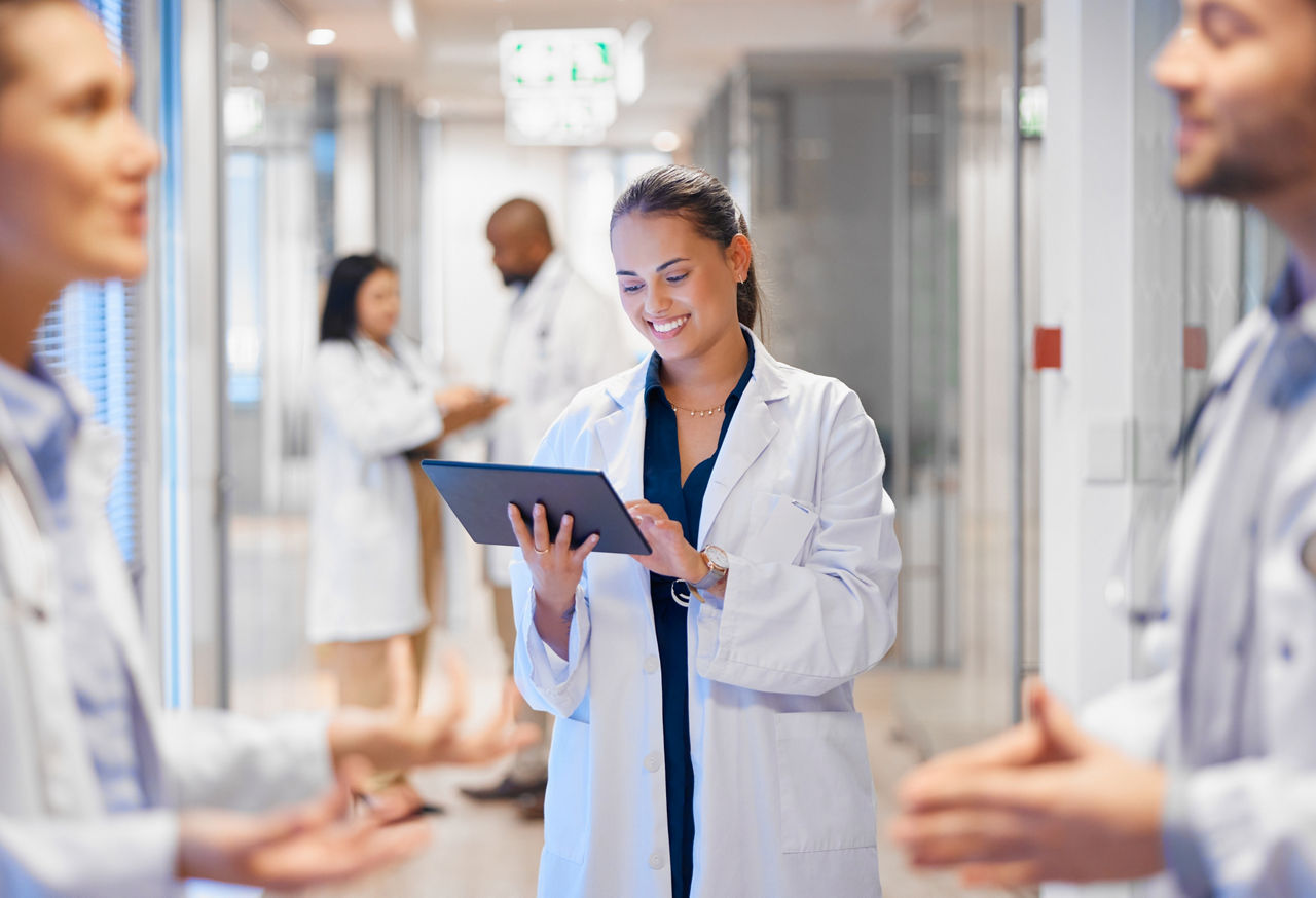 Happy woman doctor on tablet for employees management, hospital workflow and clinic staff solution on software or app. Healthcare manager on digital tech for medical team research or problem solving.