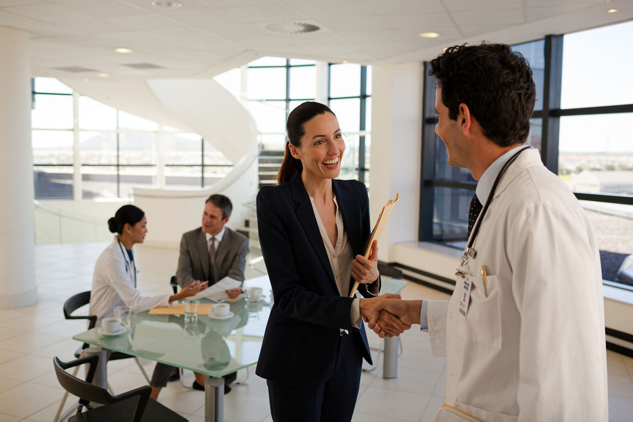 Portrait of smiling doctors and businessman