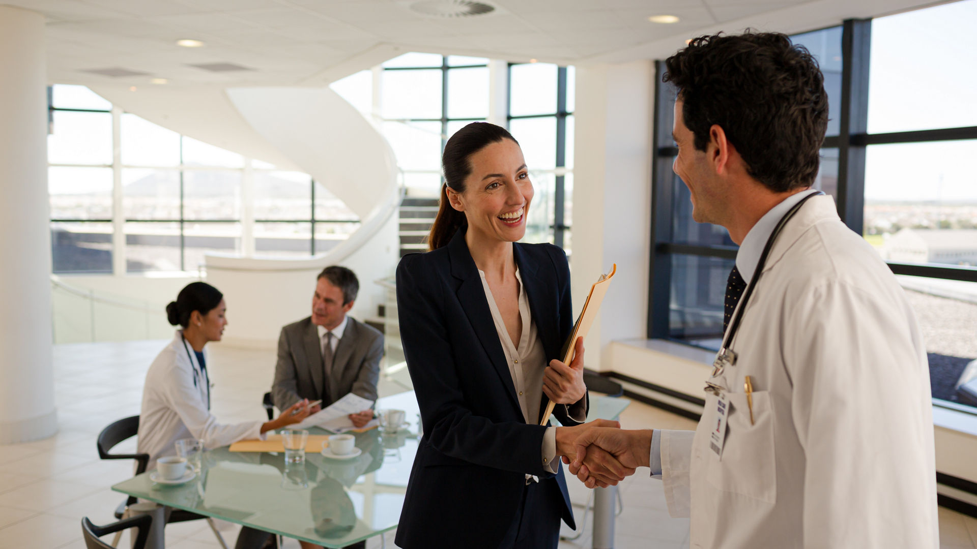 Portrait of smiling doctors and businessman